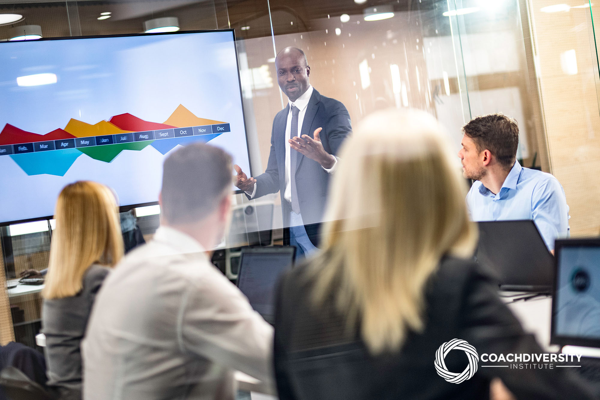 Diverse man leading a meeting